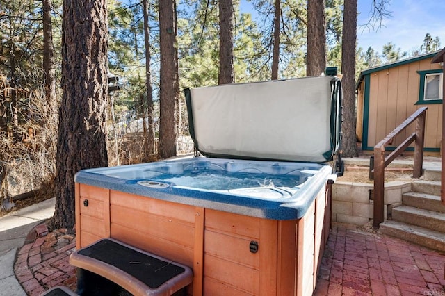 view of patio / terrace featuring a hot tub