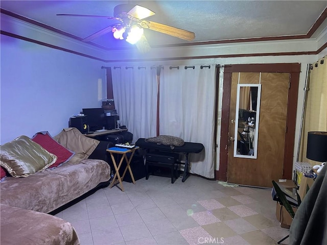 living room with ceiling fan and crown molding