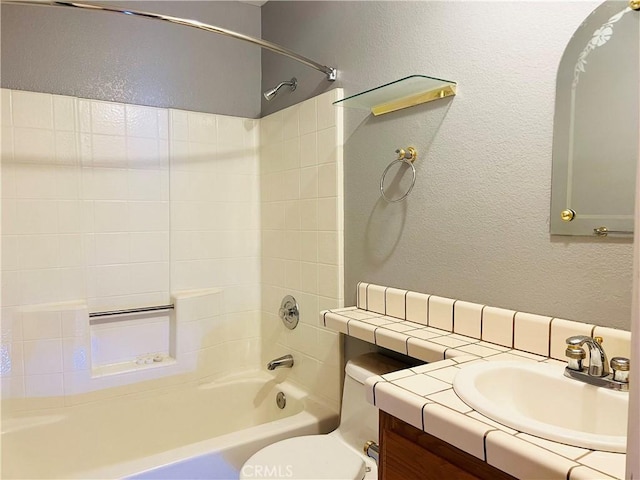 full bathroom with toilet, vanity, and shower / bathing tub combination