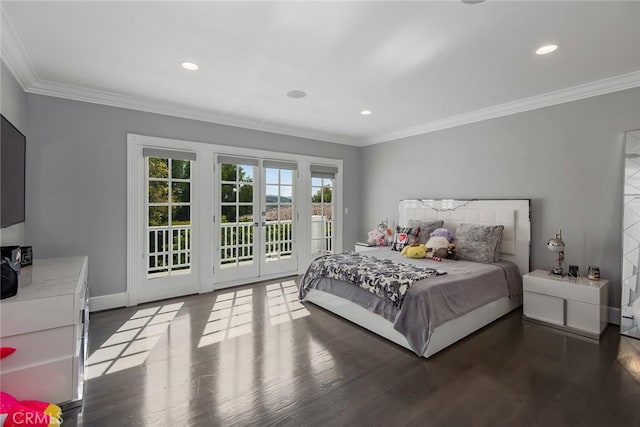 bedroom with hardwood / wood-style flooring, crown molding, and access to outside