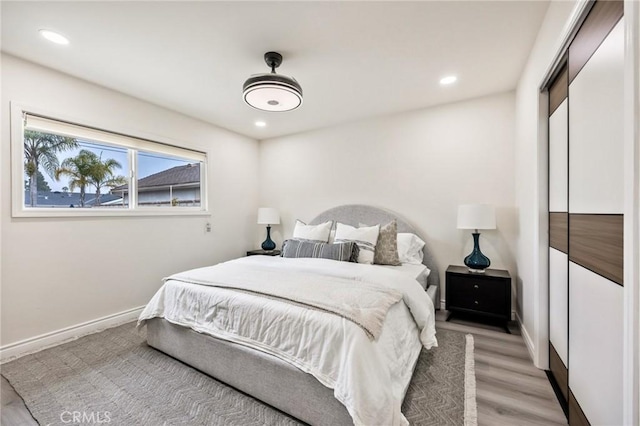 bedroom featuring light wood-type flooring