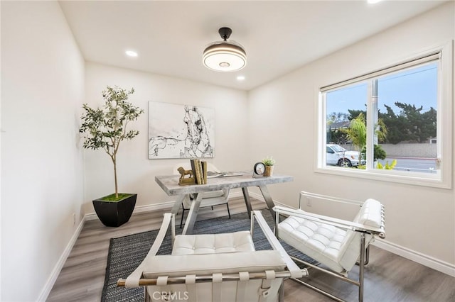 office space with hardwood / wood-style floors