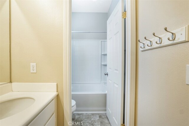 full bathroom with shower / bath combination, toilet, and vanity