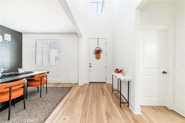 entrance foyer with light wood-type flooring