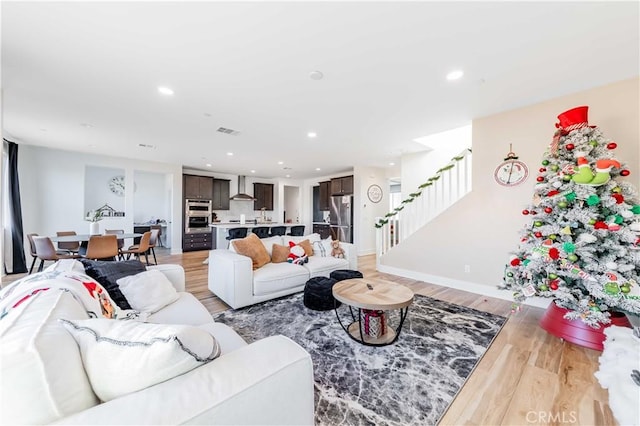 living room with light hardwood / wood-style floors