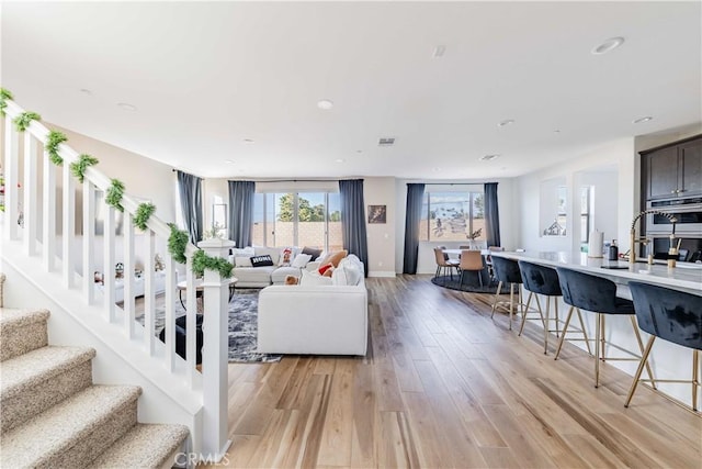 living room featuring light hardwood / wood-style floors