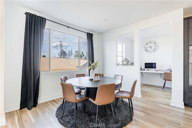 dining room featuring light hardwood / wood-style flooring