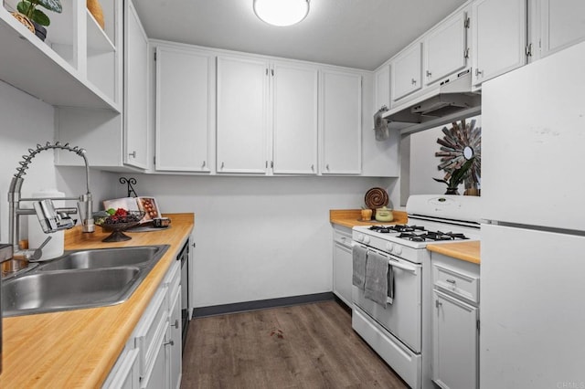 kitchen with sink, white cabinets, and white appliances