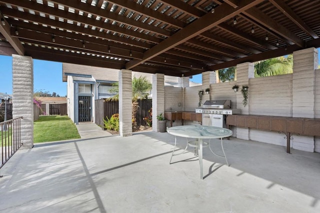 view of patio / terrace with a pergola and grilling area