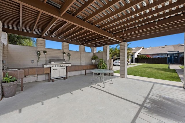 view of patio / terrace featuring a pergola and area for grilling