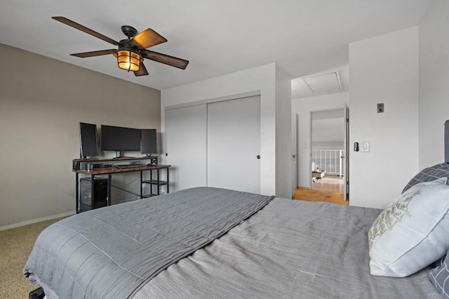 bedroom featuring ceiling fan and a closet