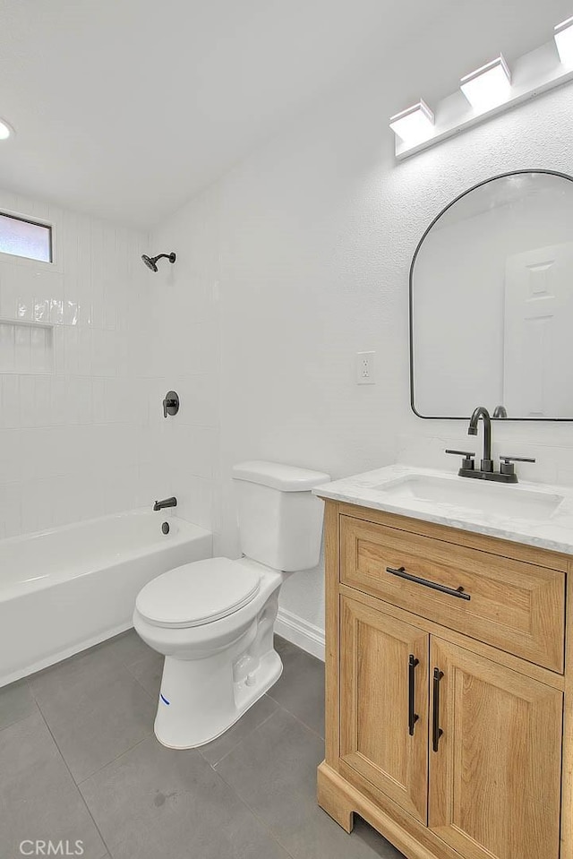 full bathroom featuring bathtub / shower combination, tile patterned floors, vanity, and toilet