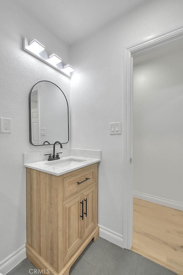 bathroom featuring vanity and tile patterned floors