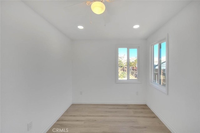 unfurnished room with light hardwood / wood-style floors