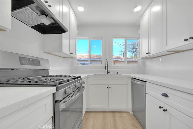 kitchen featuring white cabinets and stainless steel appliances