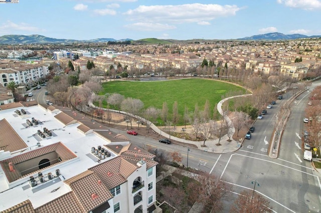 drone / aerial view featuring a mountain view