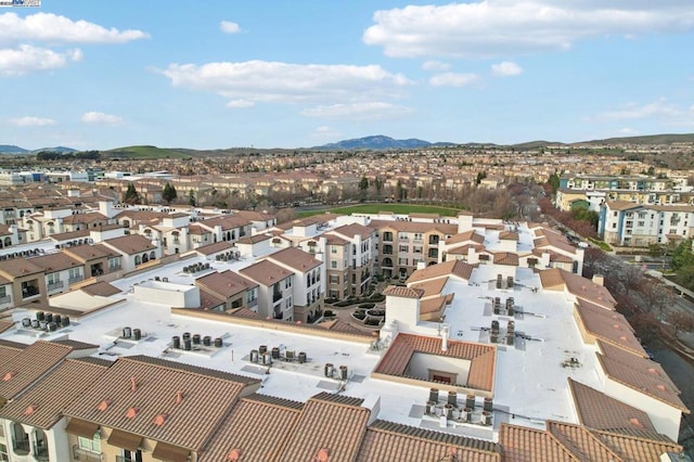 bird's eye view with a mountain view