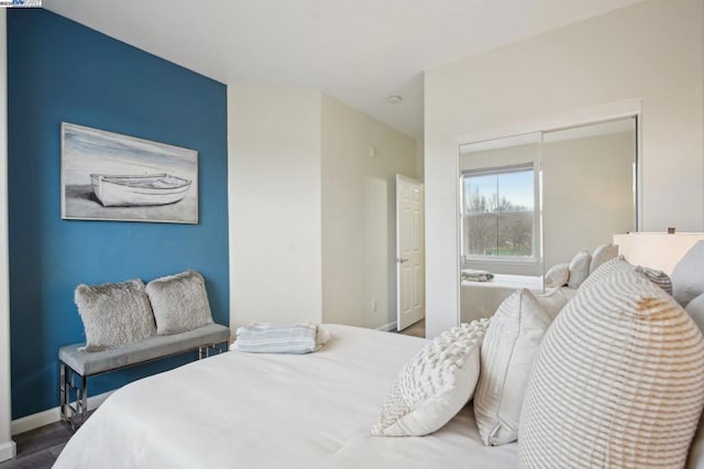 bedroom with wood-type flooring