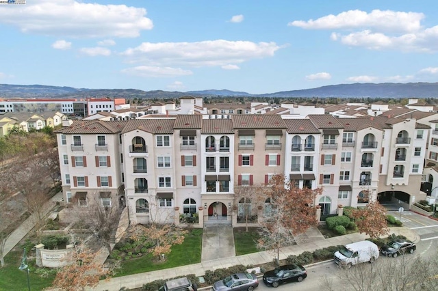 view of building exterior with a mountain view