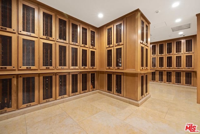 wine room with light tile patterned floors