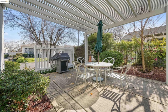 view of patio / terrace featuring a grill and a pergola