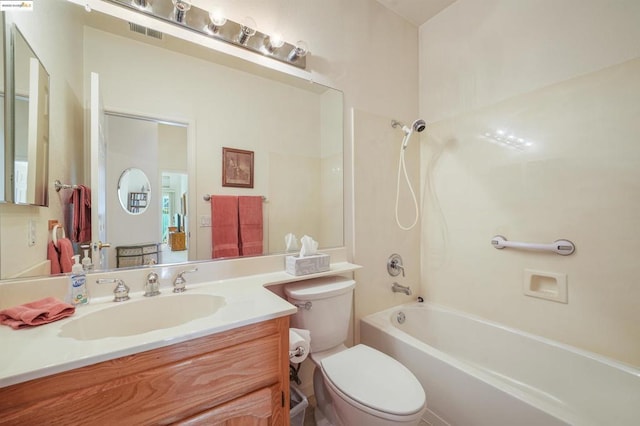 full bathroom with toilet, vanity, and bathing tub / shower combination