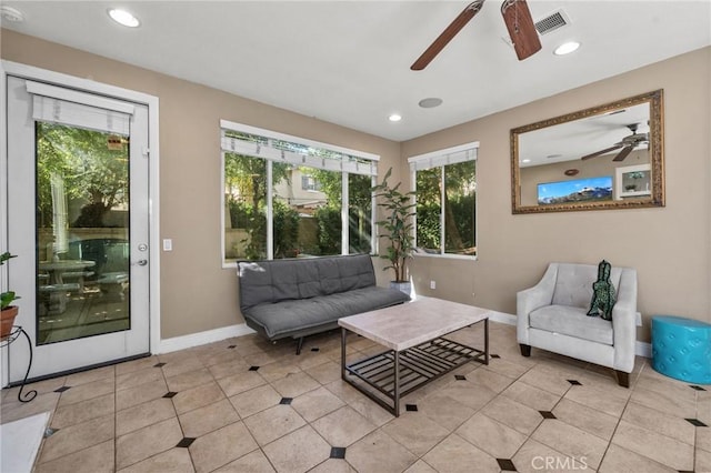 living area featuring light tile patterned floors