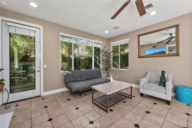 sitting room featuring light tile patterned floors