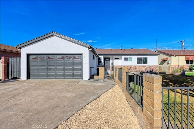 ranch-style home featuring a garage