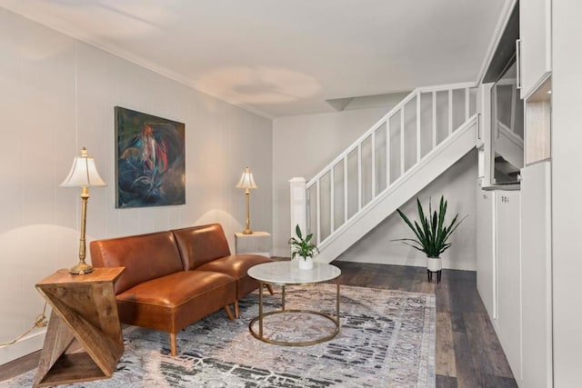 interior space featuring dark hardwood / wood-style floors and ornamental molding