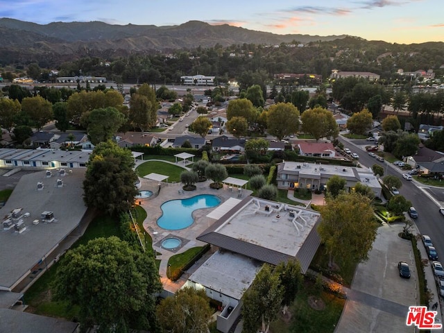 aerial view at dusk with a mountain view