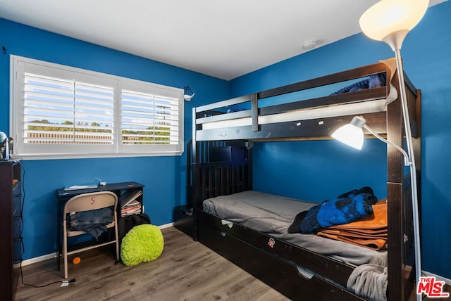 bedroom featuring hardwood / wood-style flooring