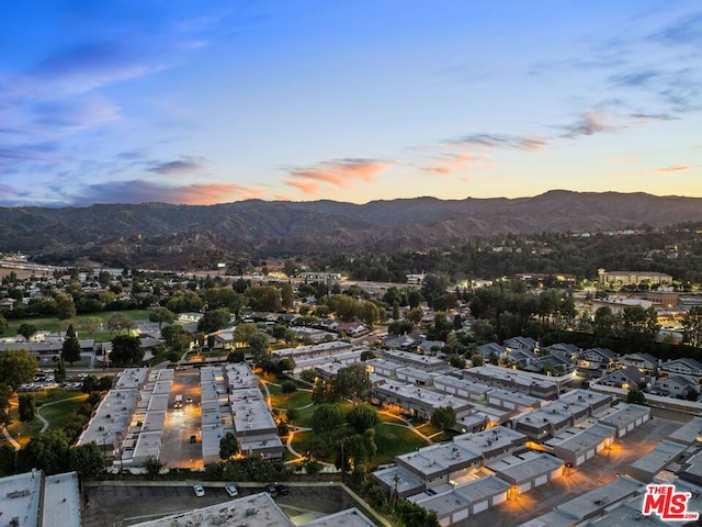 aerial view at dusk with a mountain view