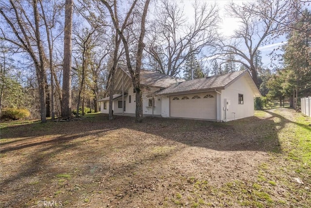 view of home's exterior featuring a garage