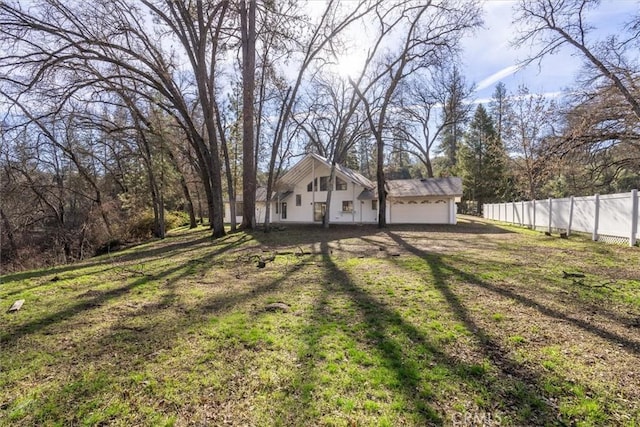 view of yard with a garage