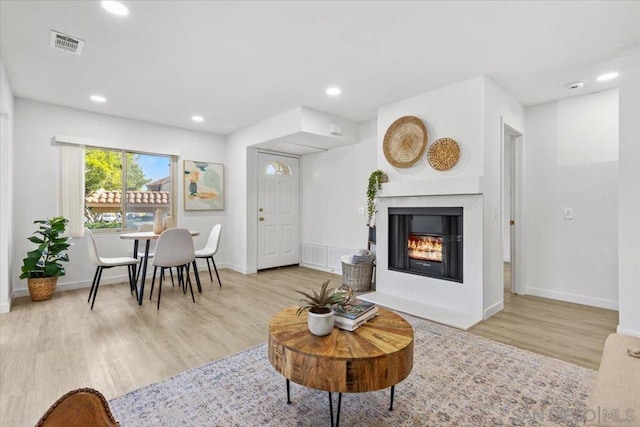 living room featuring light hardwood / wood-style flooring