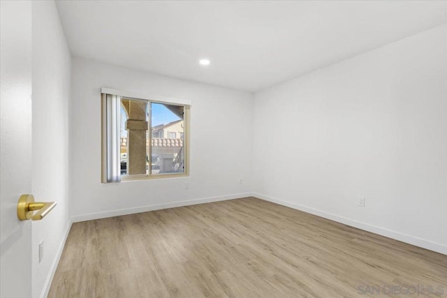 empty room featuring light hardwood / wood-style floors