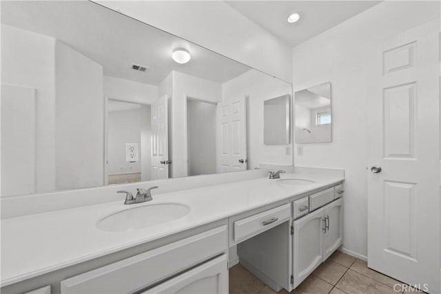 bathroom featuring vanity and tile patterned floors