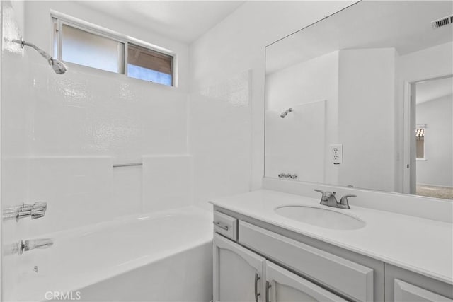 bathroom featuring vanity and shower / bathing tub combination