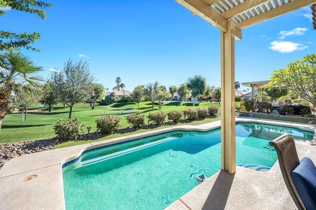 view of swimming pool featuring a lawn, a pergola, and a patio area