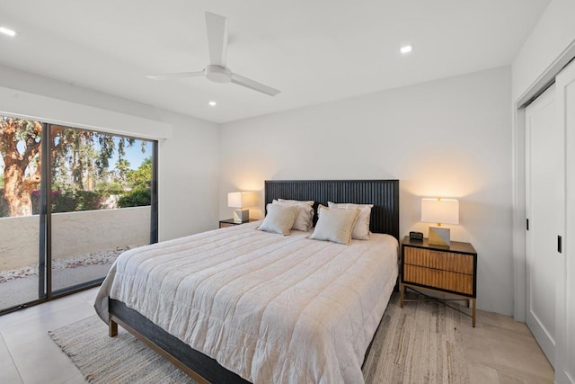 bedroom featuring ceiling fan, access to exterior, and a closet