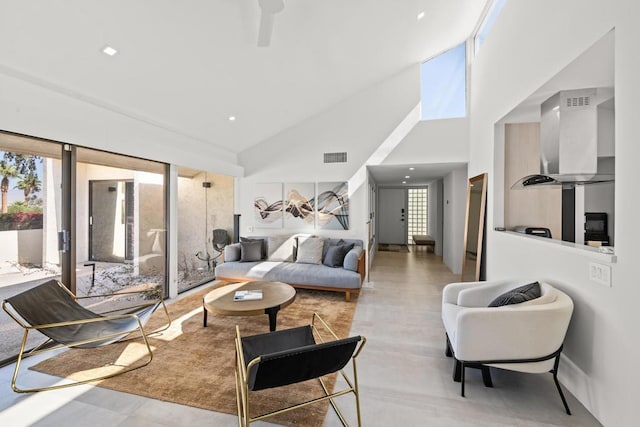 living room with a towering ceiling