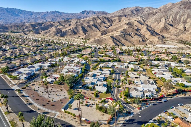 drone / aerial view featuring a mountain view