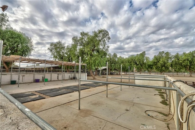 view of patio / terrace featuring an outbuilding