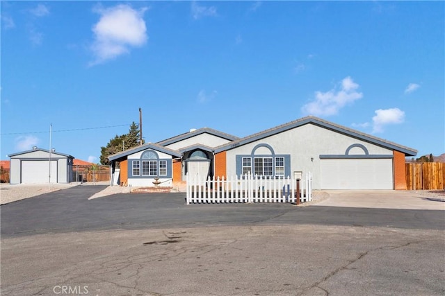 single story home with a garage