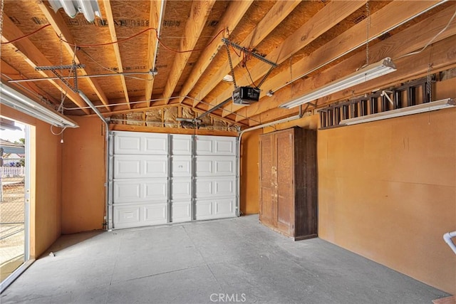 garage featuring a garage door opener