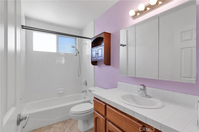 full bathroom with toilet, tile patterned floors, vanity, and bathtub / shower combination