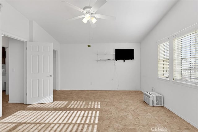 unfurnished room featuring ceiling fan, lofted ceiling, and a wall mounted air conditioner