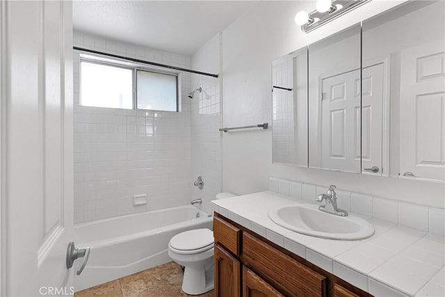 full bathroom with toilet, shower / bath combination, tile patterned floors, and vanity