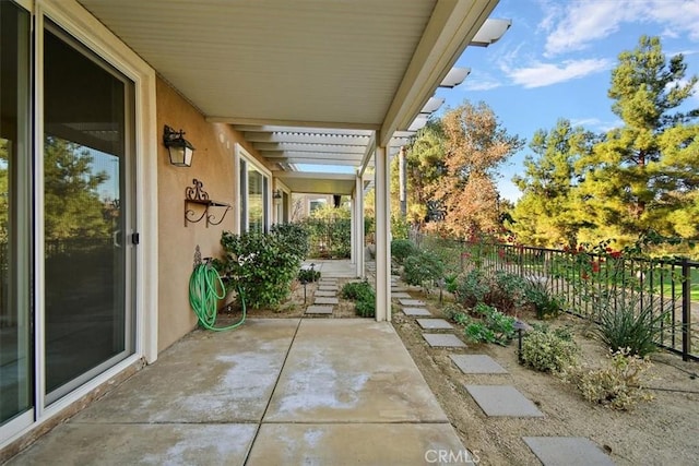 view of patio / terrace with fence